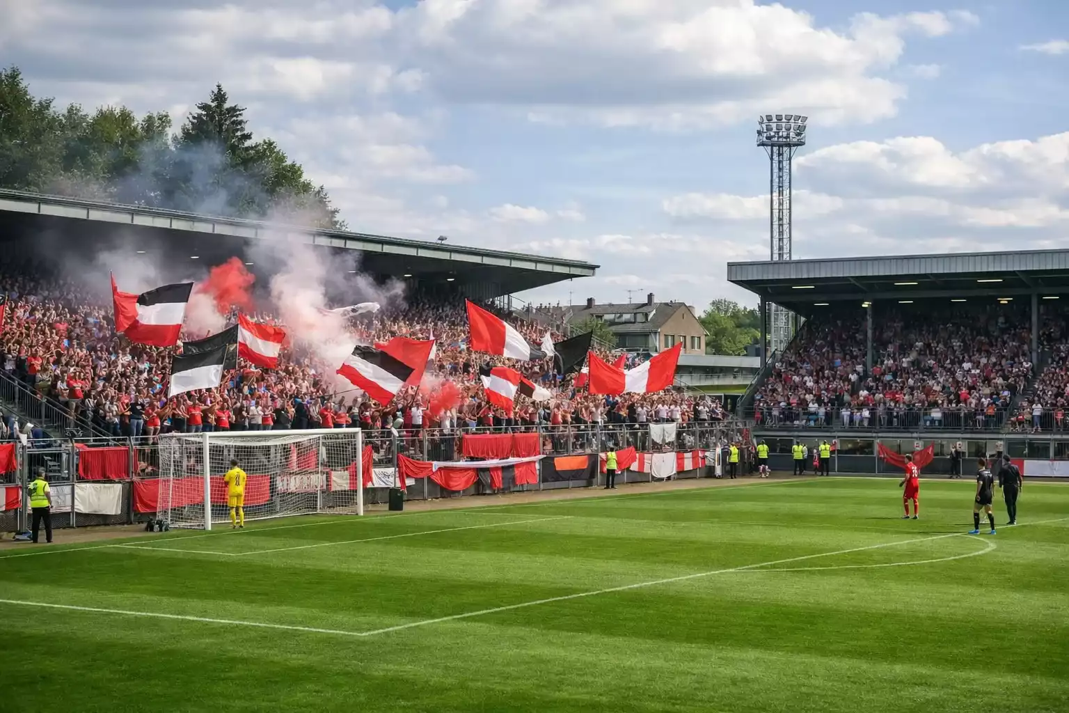 Zweitliga-Stadion mit Fans und regionaler Atmosphäre